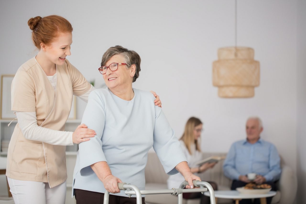 A medical stuff helps a patient.